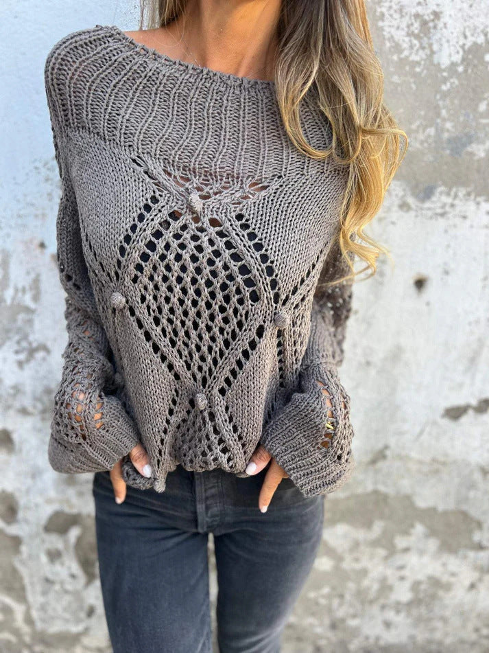 Knitted sweater with a round neckline