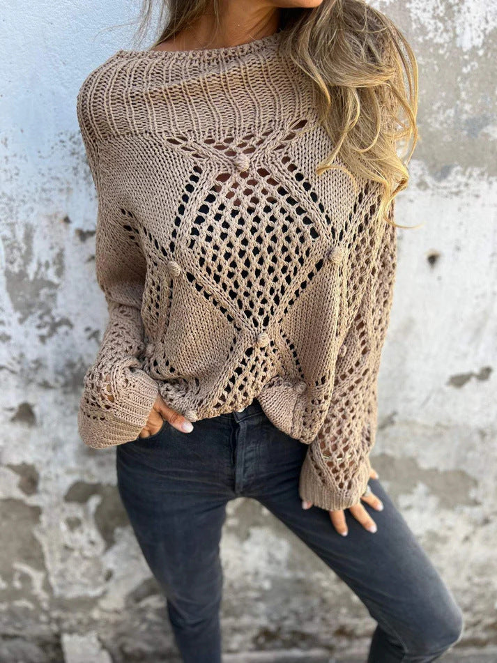 Knitted sweater with a round neckline