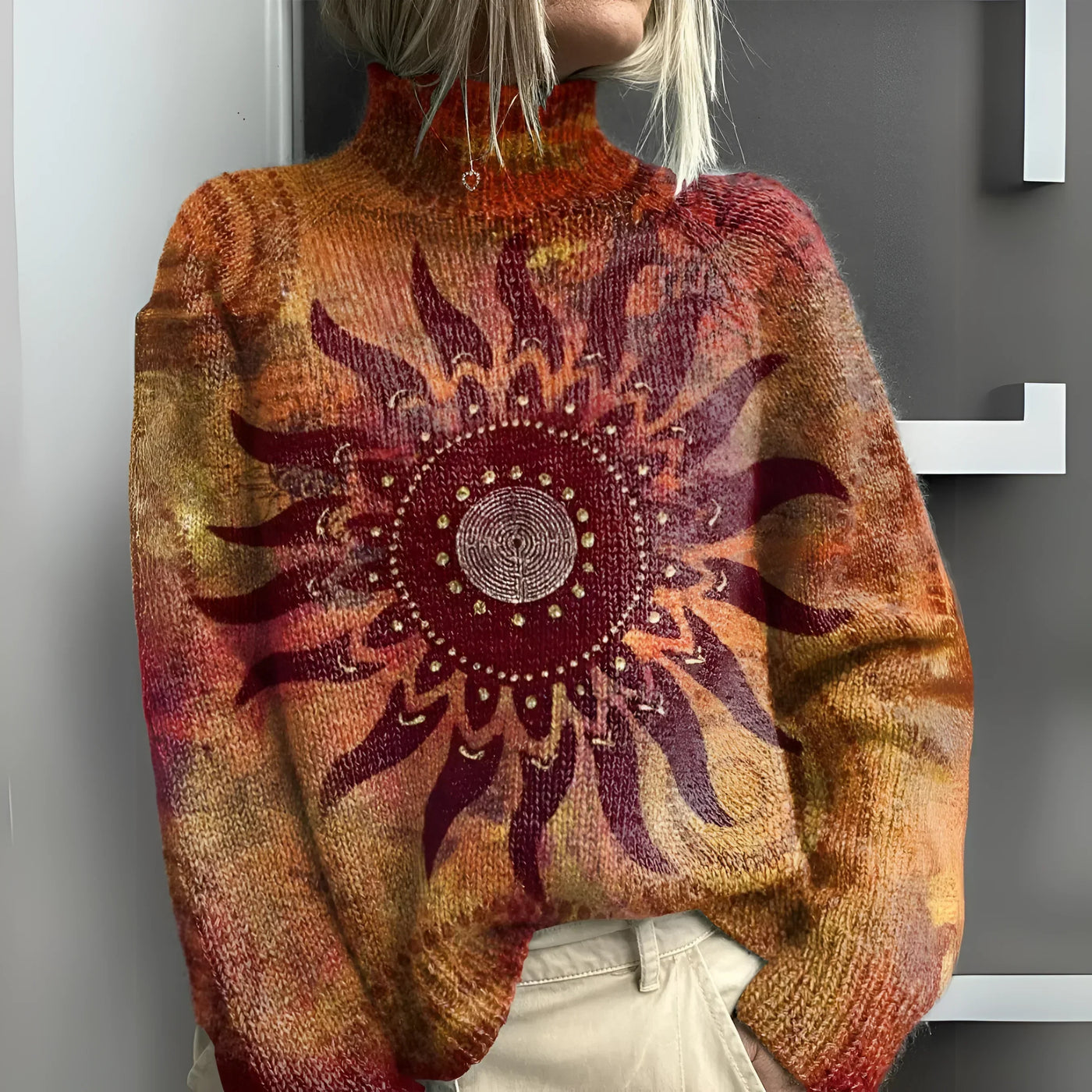 Marinett | Comfortable knitted turtleneck sweater with tribal sun